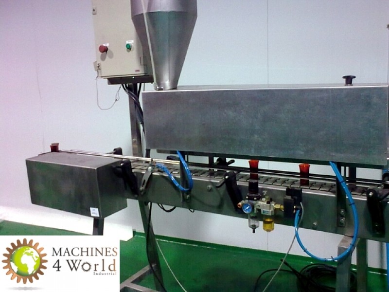 AL0040911-Filling and dosing machine for dense products.