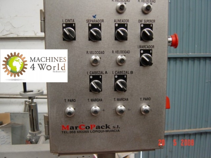 AL0330911- Marcopack Labeling machine with two head for small bottles.